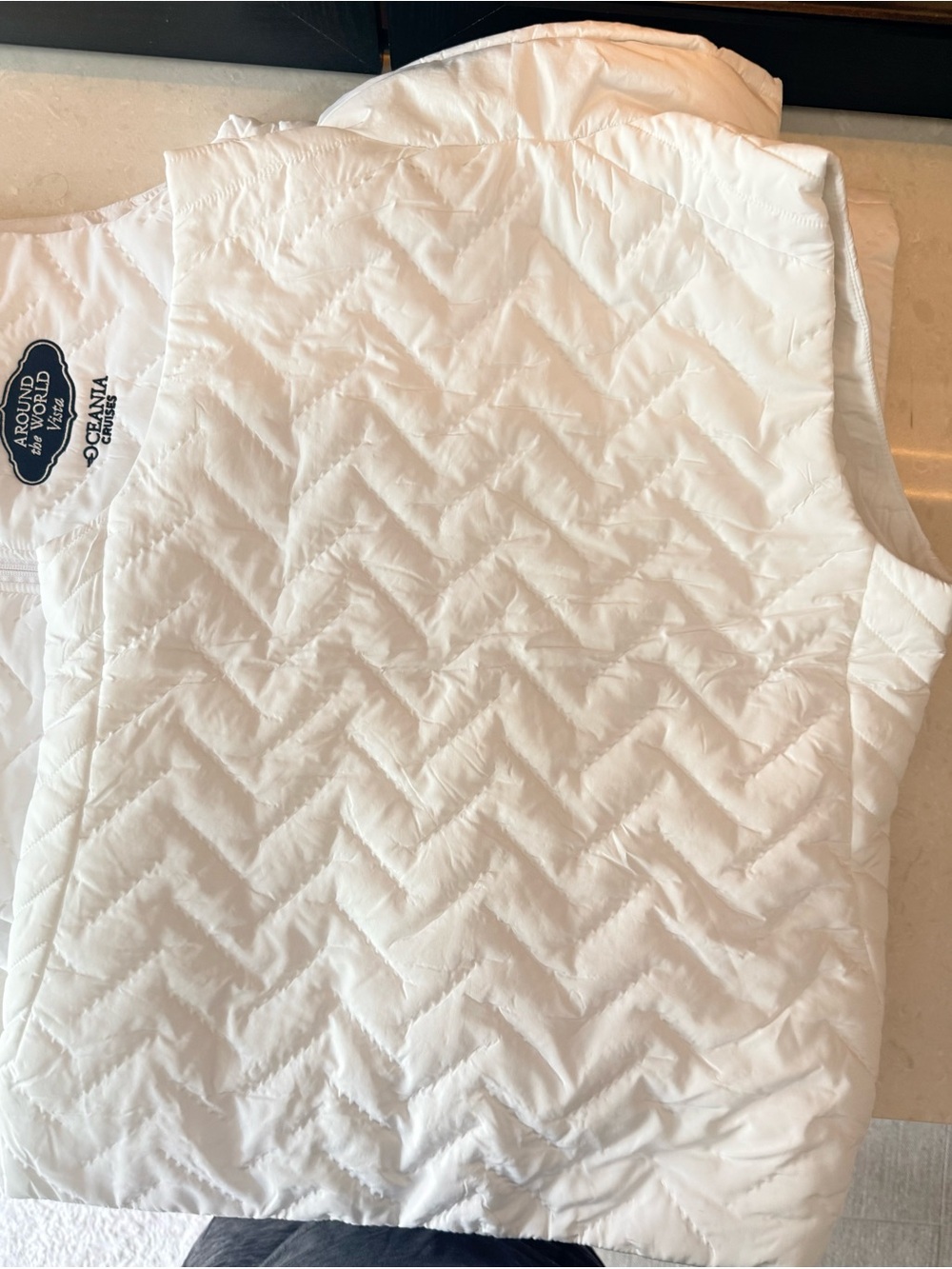 Oceania Branded Holloway White Quilted Vest with Navy Crest - Picture 3 of 5